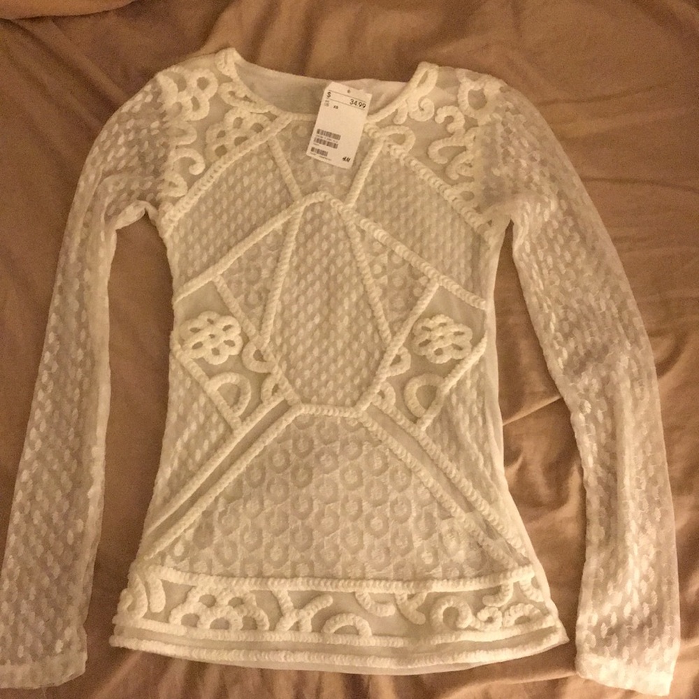 Sheer mesh woven blouse with tag. Never worn.